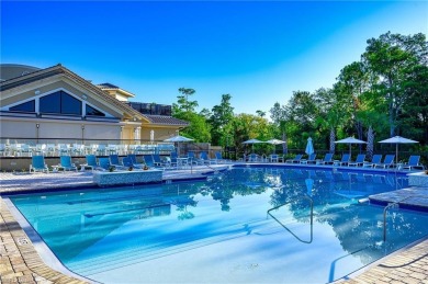 Light and bright 4th floor condo has large windows and lanai on Cedar Hammock Golf and Country Club in Florida - for sale on GolfHomes.com, golf home, golf lot