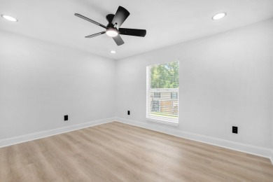 Step inside this beautifully reimagined manufactured home on Jake Gaither Golf Course in Florida - for sale on GolfHomes.com, golf home, golf lot
