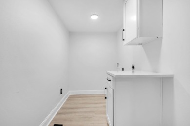 Step inside this beautifully reimagined manufactured home on Jake Gaither Golf Course in Florida - for sale on GolfHomes.com, golf home, golf lot