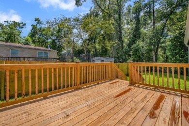 Step inside this beautifully reimagined manufactured home on Jake Gaither Golf Course in Florida - for sale on GolfHomes.com, golf home, golf lot