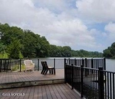Move in ready 2 bedroom 2 bath upper level unit with views of on Shadow Lake Village in New Jersey - for sale on GolfHomes.com, golf home, golf lot