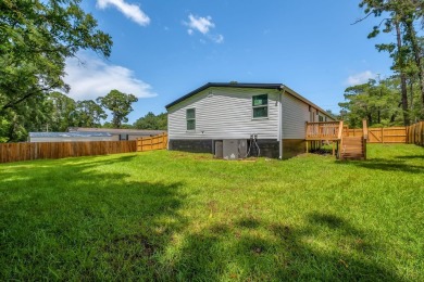 Step inside this beautifully reimagined manufactured home on Jake Gaither Golf Course in Florida - for sale on GolfHomes.com, golf home, golf lot