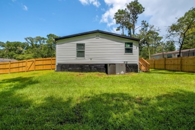 Step inside this beautifully reimagined manufactured home on Jake Gaither Golf Course in Florida - for sale on GolfHomes.com, golf home, golf lot