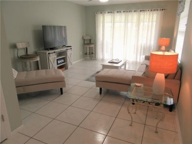 Ideal Florida living value priced and offered turnkey! Beautiful on The American Golf Club in Florida - for sale on GolfHomes.com, golf home, golf lot