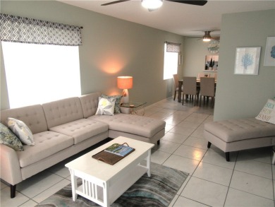 Ideal Florida living value priced and offered turnkey! Beautiful on The American Golf Club in Florida - for sale on GolfHomes.com, golf home, golf lot