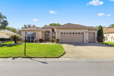 This beautifully maintained, original-owner Madeira model home on Eagle Ridge At Spruce Creek Country Club in Florida - for sale on GolfHomes.com, golf home, golf lot