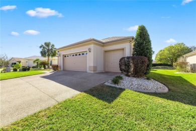 This beautifully maintained, original-owner Madeira model home on Eagle Ridge At Spruce Creek Country Club in Florida - for sale on GolfHomes.com, golf home, golf lot