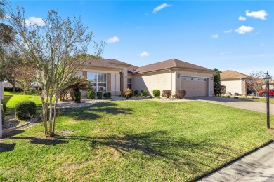 This beautifully maintained, original-owner Madeira model home on Eagle Ridge At Spruce Creek Country Club in Florida - for sale on GolfHomes.com, golf home, golf lot