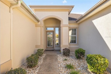 This beautifully maintained, original-owner Madeira model home on Eagle Ridge At Spruce Creek Country Club in Florida - for sale on GolfHomes.com, golf home, golf lot