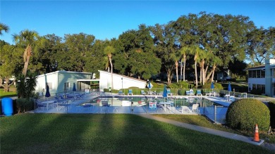 Discover comfort and convenience in this inviting 2-bedroom, 1 on Country Club At Silver Springs Shores in Florida - for sale on GolfHomes.com, golf home, golf lot