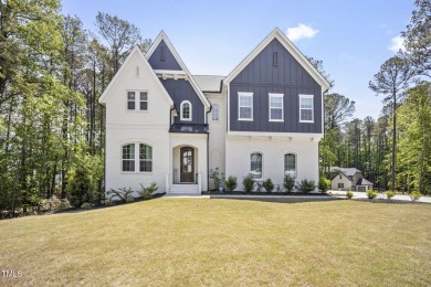 Welcome to 8237 Baronleigh Lane--a stunning single-family home on Hasentree Club in North Carolina - for sale on GolfHomes.com, golf home, golf lot