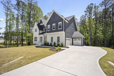 Welcome to 8237 Baronleigh Lane--a stunning single-family home on Hasentree Club in North Carolina - for sale on GolfHomes.com, golf home, golf lot