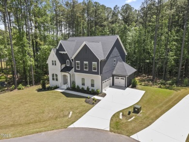 Welcome to 8237 Baronleigh Lane--a stunning single-family home on Hasentree Club in North Carolina - for sale on GolfHomes.com, golf home, golf lot