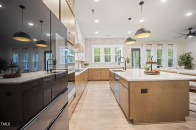 Welcome to 8237 Baronleigh Lane--a stunning single-family home on Hasentree Club in North Carolina - for sale on GolfHomes.com, golf home, golf lot