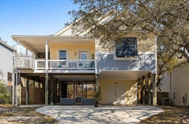 Experience the best of Oak Island living in this stunning piling on Founders Club At St. James Plantation in North Carolina - for sale on GolfHomes.com, golf home, golf lot