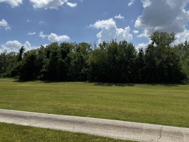 This charming 2-bedroom, 2-bathroom home offers stunning views on Lake Henry Golf Club in Florida - for sale on GolfHomes.com, golf home, golf lot