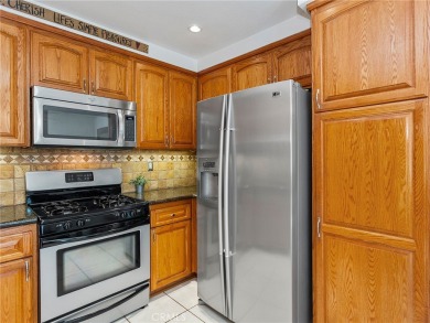 Welcome to this beautifully upgraded townhome in the highly on Vista Valencia Golf Course in California - for sale on GolfHomes.com, golf home, golf lot