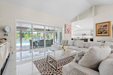 This 3BD, 2.5BA CBS pool home in Palm City is anything but on Evergreen Club in Florida - for sale on GolfHomes.com, golf home, golf lot