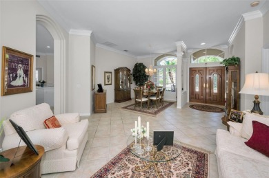 This beautifully maintained 4-bedroom, 3-bath residence is on Lansbrook Golf Club in Florida - for sale on GolfHomes.com, golf home, golf lot