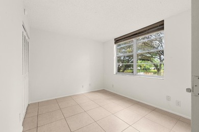 Beautiful 2-bedroom, 2-bath condominium with peaceful garden on Pine Island Ridge Country Club in Florida - for sale on GolfHomes.com, golf home, golf lot