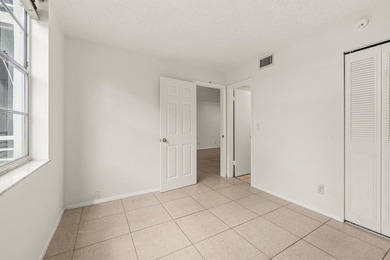 Beautiful 2-bedroom, 2-bath condominium with peaceful garden on Pine Island Ridge Country Club in Florida - for sale on GolfHomes.com, golf home, golf lot