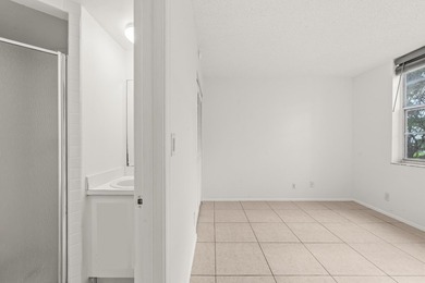 Beautiful 2-bedroom, 2-bath condominium with peaceful garden on Pine Island Ridge Country Club in Florida - for sale on GolfHomes.com, golf home, golf lot