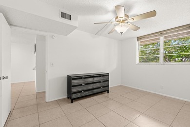 Beautiful 2-bedroom, 2-bath condominium with peaceful garden on Pine Island Ridge Country Club in Florida - for sale on GolfHomes.com, golf home, golf lot