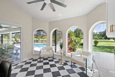 This 3BD, 2.5BA CBS pool home in Palm City is anything but on Evergreen Club in Florida - for sale on GolfHomes.com, golf home, golf lot