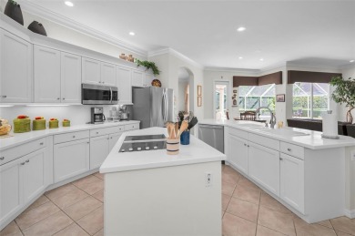 This beautifully maintained 4-bedroom, 3-bath residence is on Lansbrook Golf Club in Florida - for sale on GolfHomes.com, golf home, golf lot