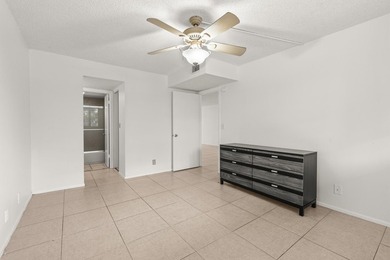 Beautiful 2-bedroom, 2-bath condominium with peaceful garden on Pine Island Ridge Country Club in Florida - for sale on GolfHomes.com, golf home, golf lot