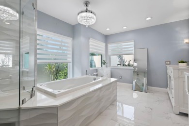 This 3BD, 2.5BA CBS pool home in Palm City is anything but on Evergreen Club in Florida - for sale on GolfHomes.com, golf home, golf lot