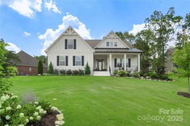 This stunning Stonebridge golf community home with 4-bedrooms on Stonebridge Golf Club in North Carolina - for sale on GolfHomes.com, golf home, golf lot