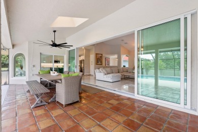 This 3BD, 2.5BA CBS pool home in Palm City is anything but on Evergreen Club in Florida - for sale on GolfHomes.com, golf home, golf lot