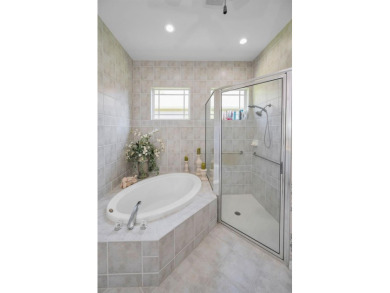 This beautifully maintained 4-bedroom, 3-bath residence is on Lansbrook Golf Club in Florida - for sale on GolfHomes.com, golf home, golf lot