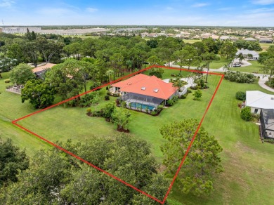 This 3BD, 2.5BA CBS pool home in Palm City is anything but on Evergreen Club in Florida - for sale on GolfHomes.com, golf home, golf lot