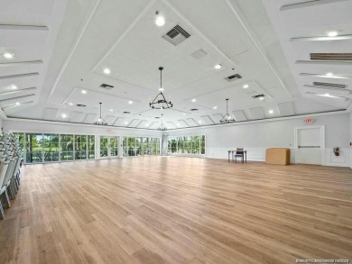 This 3BD, 2.5BA CBS pool home in Palm City is anything but on Evergreen Club in Florida - for sale on GolfHomes.com, golf home, golf lot