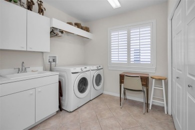 This beautifully maintained 4-bedroom, 3-bath residence is on Lansbrook Golf Club in Florida - for sale on GolfHomes.com, golf home, golf lot