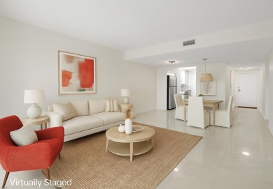 Embrace easy living in this sunlit 2BR/2BA end-unit condo in on The Little Club in Florida - for sale on GolfHomes.com, golf home, golf lot