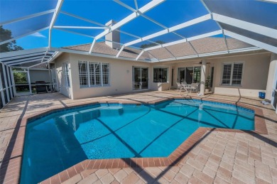 This beautifully maintained 4-bedroom, 3-bath residence is on Lansbrook Golf Club in Florida - for sale on GolfHomes.com, golf home, golf lot