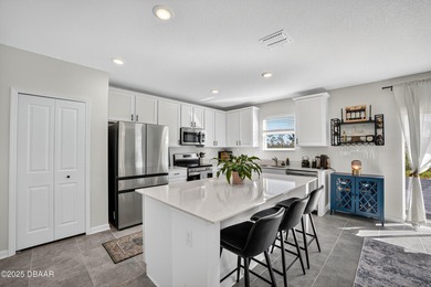 Welcome to this stunning 4-bedroom, 2.5-bath single-family home on LPGA International Golf Course in Florida - for sale on GolfHomes.com, golf home, golf lot