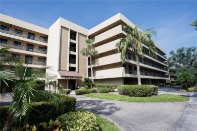 Top-Floor Condo with Golf Course Views, Elevator Access on Tarpon Springs Golf Course in Florida - for sale on GolfHomes.com, golf home, golf lot