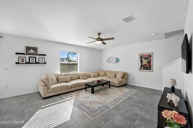 Welcome to this stunning 4-bedroom, 2.5-bath single-family home on LPGA International Golf Course in Florida - for sale on GolfHomes.com, golf home, golf lot