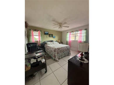 Beautiful 2 bedroom 2 bath 55+ Community condo . This property on Sunrise Lakes Phase III in Florida - for sale on GolfHomes.com, golf home, golf lot