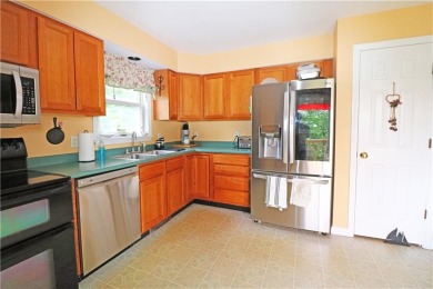 Colonial styled home with 3 beds & 3 baths including a water on Montaup Country Club in Rhode Island - for sale on GolfHomes.com, golf home, golf lot