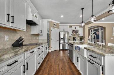 This beautifully maintained home positioned behind the 13th tee on Crow Creek Golf Club in North Carolina - for sale on GolfHomes.com, golf home, golf lot