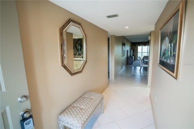 Top-Floor Condo with Golf Course Views, Elevator Access on Tarpon Springs Golf Course in Florida - for sale on GolfHomes.com, golf home, golf lot