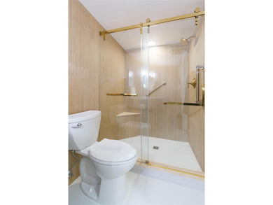 3rd floor 2-bedroom, 2 bath Crystal Bay condo overlooking the on Feather Sound Country Club in Florida - for sale on GolfHomes.com, golf home, golf lot