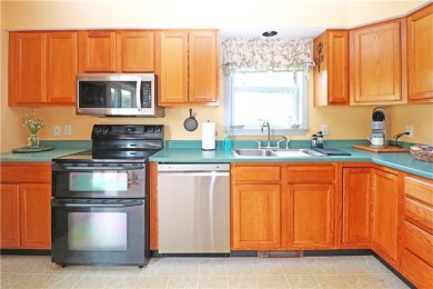 Colonial styled home with 3 beds & 3 baths including a water on Montaup Country Club in Rhode Island - for sale on GolfHomes.com, golf home, golf lot