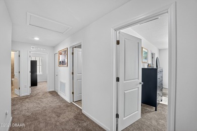 Welcome to this stunning 4-bedroom, 2.5-bath single-family home on LPGA International Golf Course in Florida - for sale on GolfHomes.com, golf home, golf lot