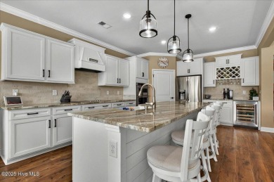 This beautifully maintained home positioned behind the 13th tee on Crow Creek Golf Club in North Carolina - for sale on GolfHomes.com, golf home, golf lot